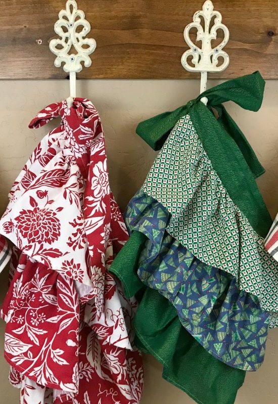 Nostalgic Farmhouse Christmas Aprons & Towels | blowingawayoutwest.com - Tutorial for Farmhouse Christmas (or any occasion) ruffled aprons and fun Christmas towels #holidaybaking #farmhouseapron #Christmasapron #christmastowels #12daysofChristmas