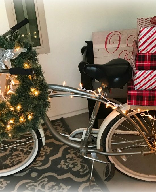 Journey to Christmas Porch Decor | blowingawayoutwest.com - Bicycle inspired Christmas porch decor. #christmasporchdecor #christmasporchdecorations #christmasbicycle #christmasporch #holidayporch #christmasdisplay #12daysofchristmas