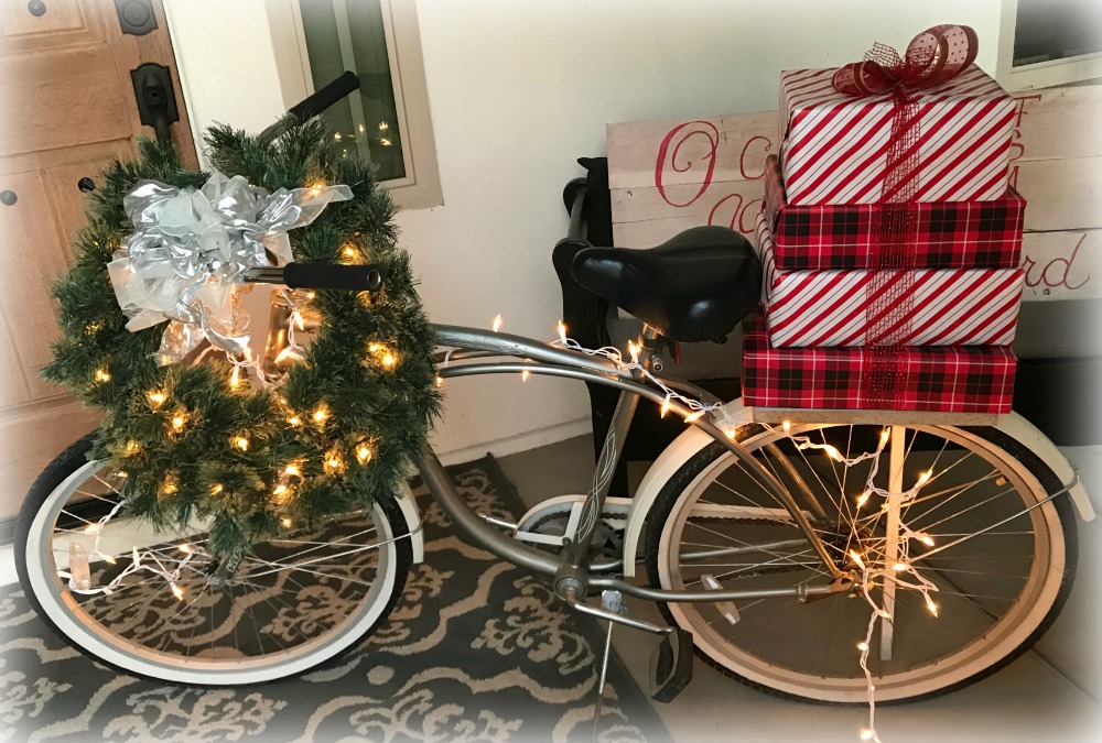 Journey to Christmas Porch Decor | blowingawayoutwest.com - Bicycle inspired Christmas porch decor. #christmasporchdecor #christmasporchdecorations #christmasbicycle #christmasporch #holidayporch #christmasdisplay #12daysofchristmas