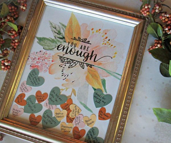 You're Enough Genuine Compliments Gift Idea | blowingawayoutwest.com - Tell her how much she means with framed gift hearts filled with compliments #giftsforher #diygiftsforher #giftsforwomen #youreenough #diychristmasgifts #diychristmasgiftsforher #giftsforgirls