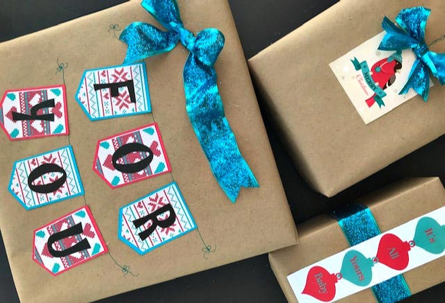 Cheeky Retro Christmas Wrapping Ideas and Wrapping Hacks | blowingawayoutwest.com - Christmas Wrapping Ideas and Hacks with Free Printable Tags #christmaswrappingideas #christmaswrapping #christmasgiftwrap#christmasretro#christmascheeky #freechristmastags #freechristmasprintables #12daysofChristmas #deckthehome #deckthehomebloghop #wrappinghacks #giftwrappinghacks