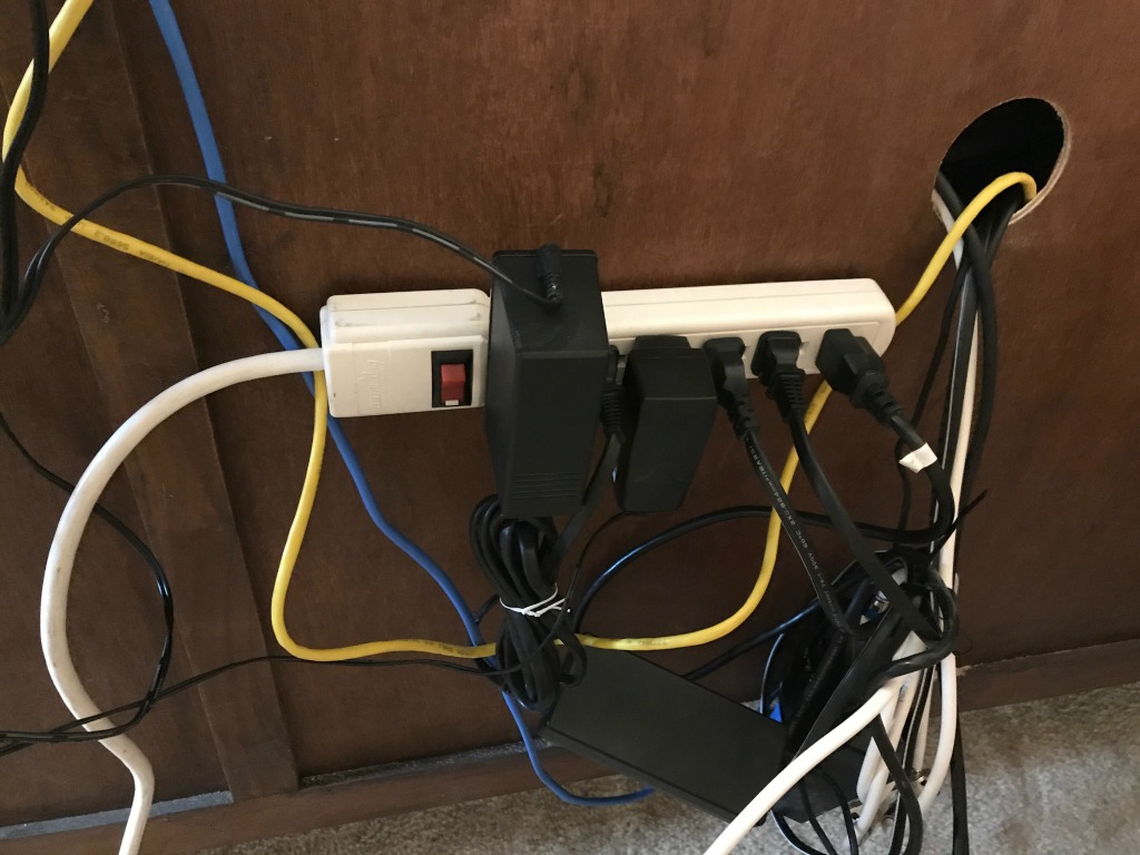 Cord Control : 4 Easy Hacks to Hide the Mess | blowingawayoutwest.com -Easy ways to hide Cords so they don't get in the way of your interior design #cordcontrol #howtohidecords #howtohidetvcords #homeimprovement #doityourself #howtoDIYprojects