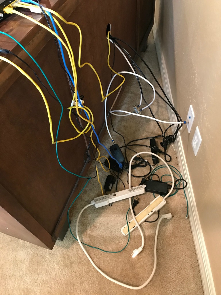 Cord Control : 4 Easy Hacks to Hide the Mess | blowingawayoutwest.com -Easy ways to hide Cords so they don't get in the way of your interior design #cordcontrol #howtohidecords #howtohidetvcords #homeimprovement #doityourself #howtoDIYprojects